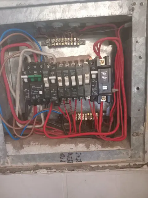 Close-up of a Deye inverter control display after installation by Hebert Electrical